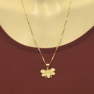 Cadena y dije new oro enchapado